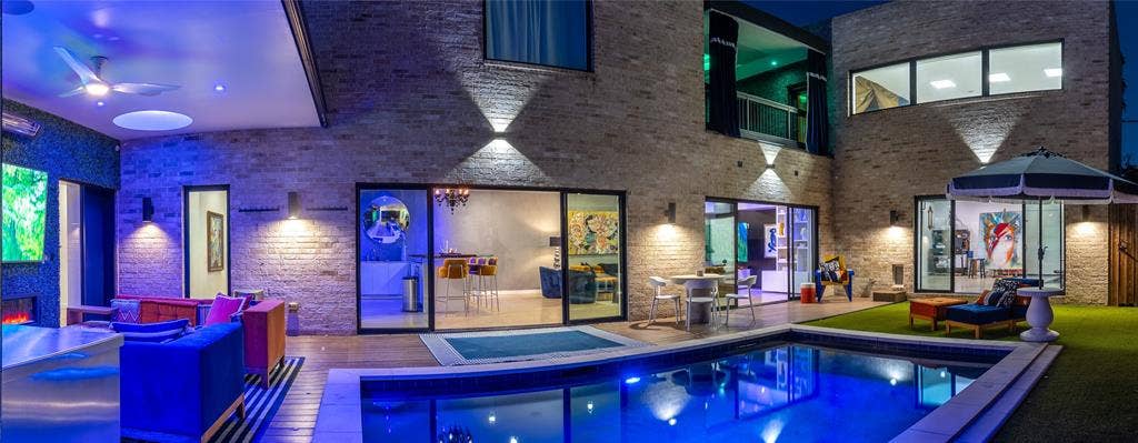 2010 Mcmillan Avenue, Dallas, TX 75206 The heart and soul of this home: 180 degrees of pool area and blissful living.