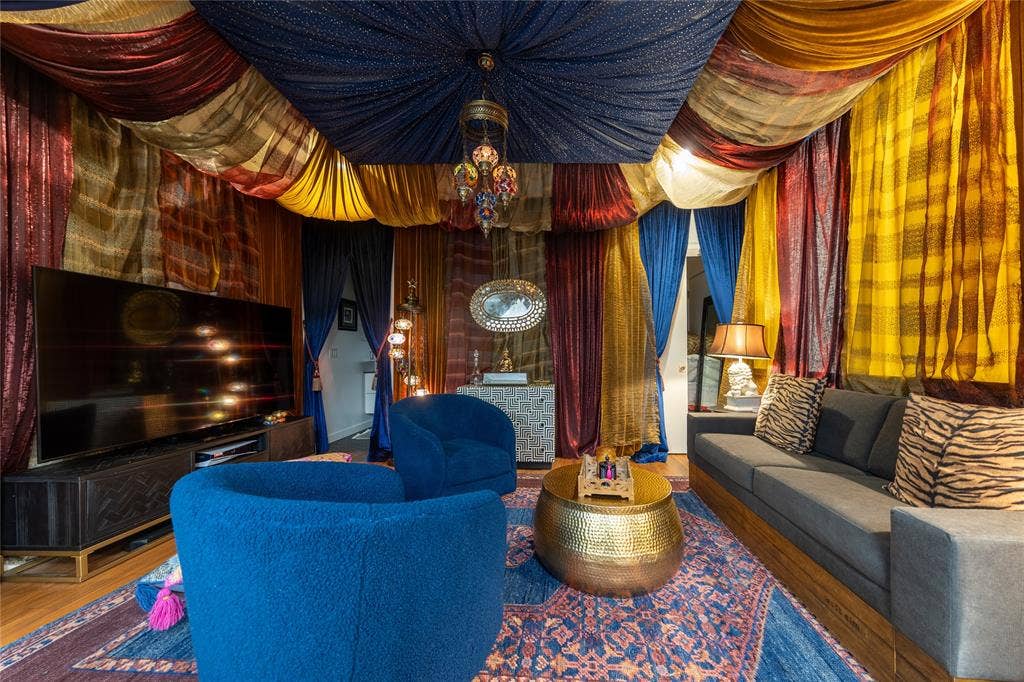 2010 Mcmillan Avenue, Dallas, TX 75206 This bedroom off the studio has been finished with a Moroccan theme, evoking the inside of a Genie's bottle.