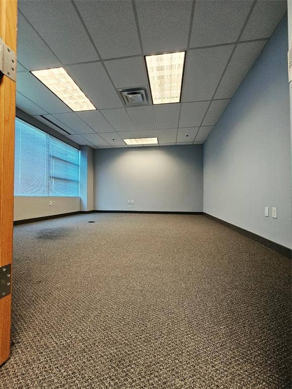 1675 Republic Parkway, #201B, Mesquite, TX 75150 Recessed ceiling grid, integrated fluorescent lighting, and wall-to-wall carpeting