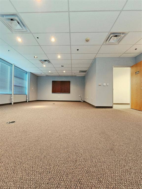 1675 Republic Parkway, #201B, Mesquite, TX 75150 Recessed lighting, drop ceiling, carpeted flooring, window blinds, and built-in wall cabinetry