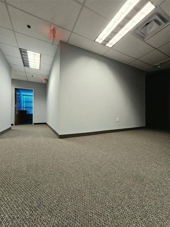 1675 Republic Parkway, #201B, Mesquite, TX 75150 Commercial-grade carpet flooring, drop ceiling with integrated fluorescent lighting, and painted walls