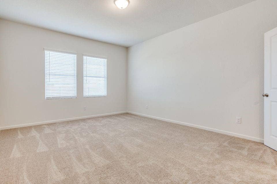 212 Briar Cove, Anna, TX 75409 Neutral wall paint and carpeted flooring