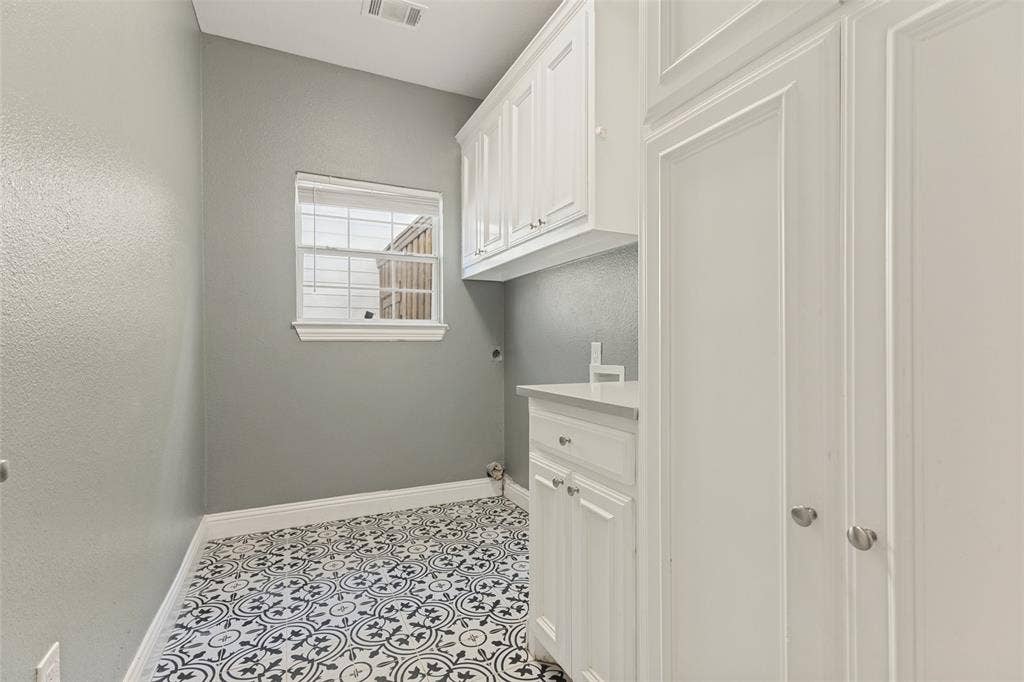 Laundry room with built-ins great for mudroom use too