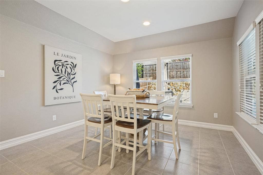 Breakfast room overlooks the backyard retreat!