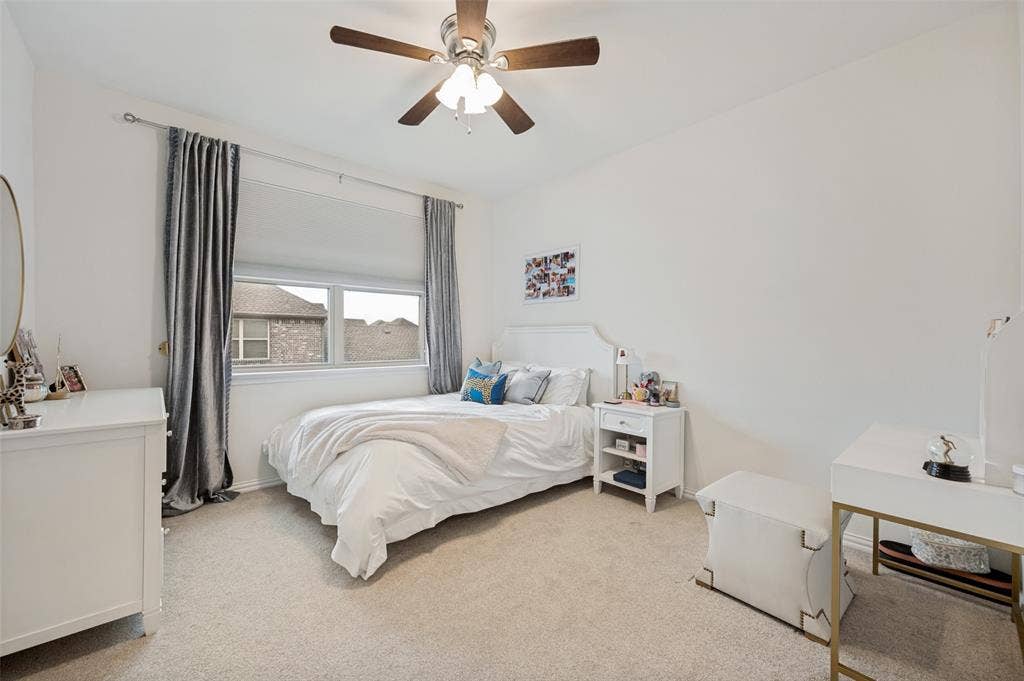 131 Darian Drive, Prosper, TX 75078 Recessed lighting, ceiling fan with light fixture, window with roller shade, and light-toned carpeting