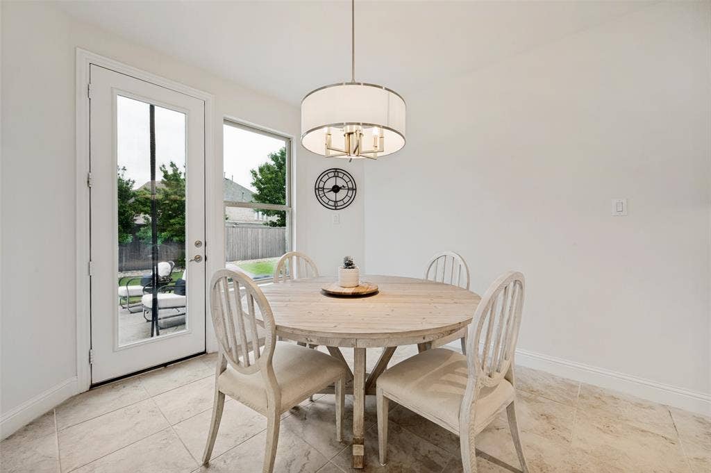 131 Darian Drive, Prosper, TX 75078 Tile flooring, a full-lite exterior door, and a built-in light fixture