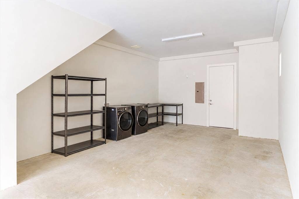 381 E Greenbriar Lane, #1001, Dallas, TX 75203 Private Oversized Two-Car Tandem Garage; HOA includes valet trash pick-up.