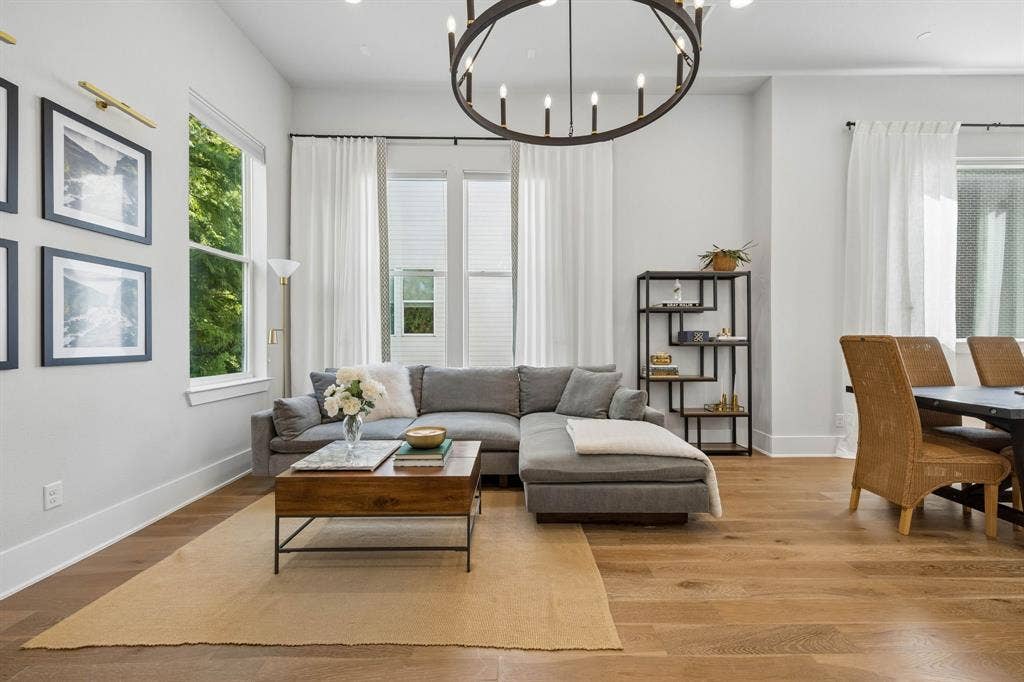 381 E Greenbriar Lane, #1001, Dallas, TX 75203 This residence maintains a great deal of privacy and its location offers tree top views off the living room.