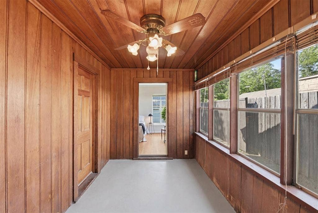2307 Lawndale Drive, Dallas, TX 75211 Enclosed side porch, looking back towards the primary bedroom, where the envisioned ensuite bath would be.