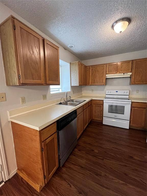 724 Ballard Street, Cedar Hill, TX 75104 Kitchen with dishwashing machine, exhaust hood, range, and dark wood-type flooring