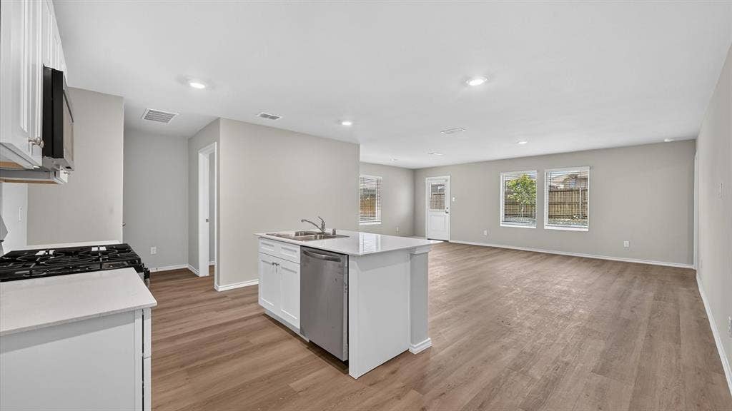 Kitchen - All Home and community information, including pricing, included features, terms, availability and amenities, are subject to change at any time without notice or obligation. All Drawings, pictures, photographs, video, square footages, floor plans, elevations, features, colors and sizes are approximate for illustration purposes only and will vary from the homes as built.