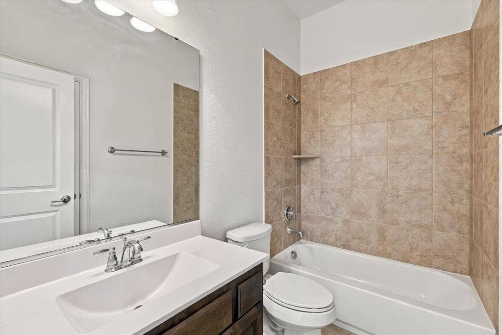 Full bathroom downstairs serving the guest bedroom.