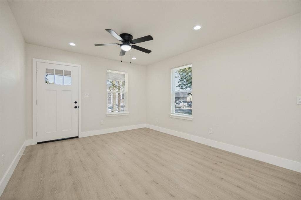 Light wood-finish flooring, recessed lighting, and a ceiling fan