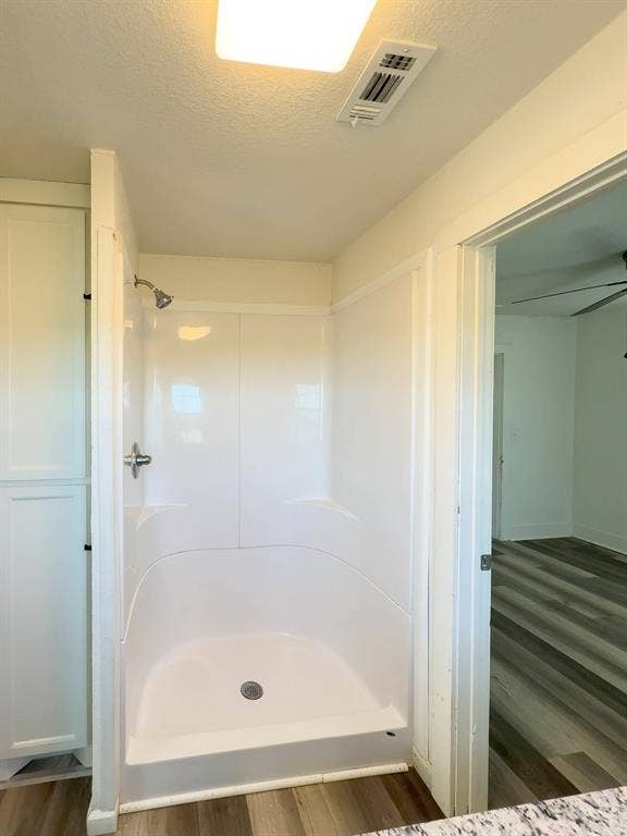 150 Fm 1996, Oglesby, TX 76561 Walk-in shower in the shared Jack-and-Jill bathroom of this Oglesby, Texas home