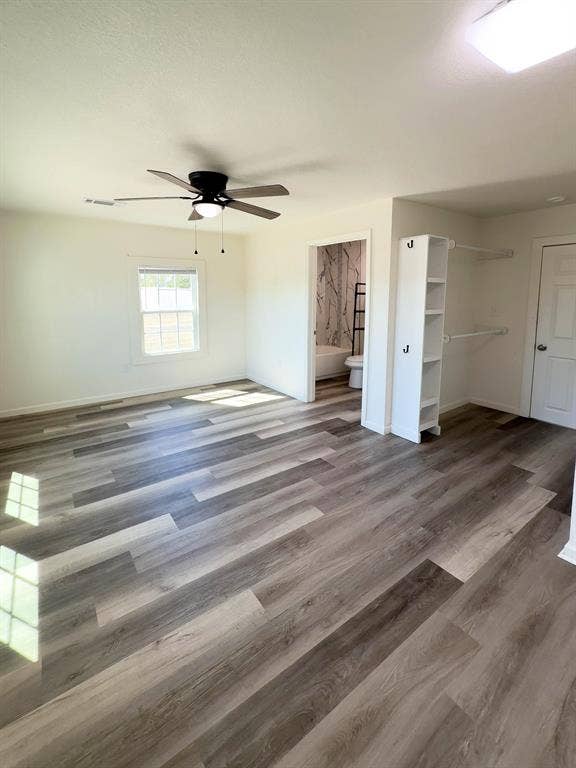 150 Fm 1996, Oglesby, TX 76561 Primary bedroom with ceiling fan, natural light, and access to a private porch