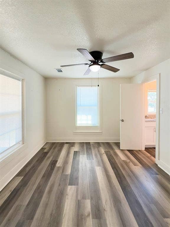 150 Fm 1996, Oglesby, TX 76561 Bedroom with natural light, ceiling fan, and access to the shared Jack-and-Jill bathroom
