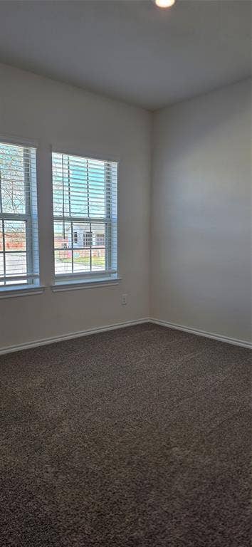 3904 Malachite Drive, Celina, TX 75009 Two windows with blinds, recessed ceiling light, wall-to-wall carpeting, and light-toned wall finishes