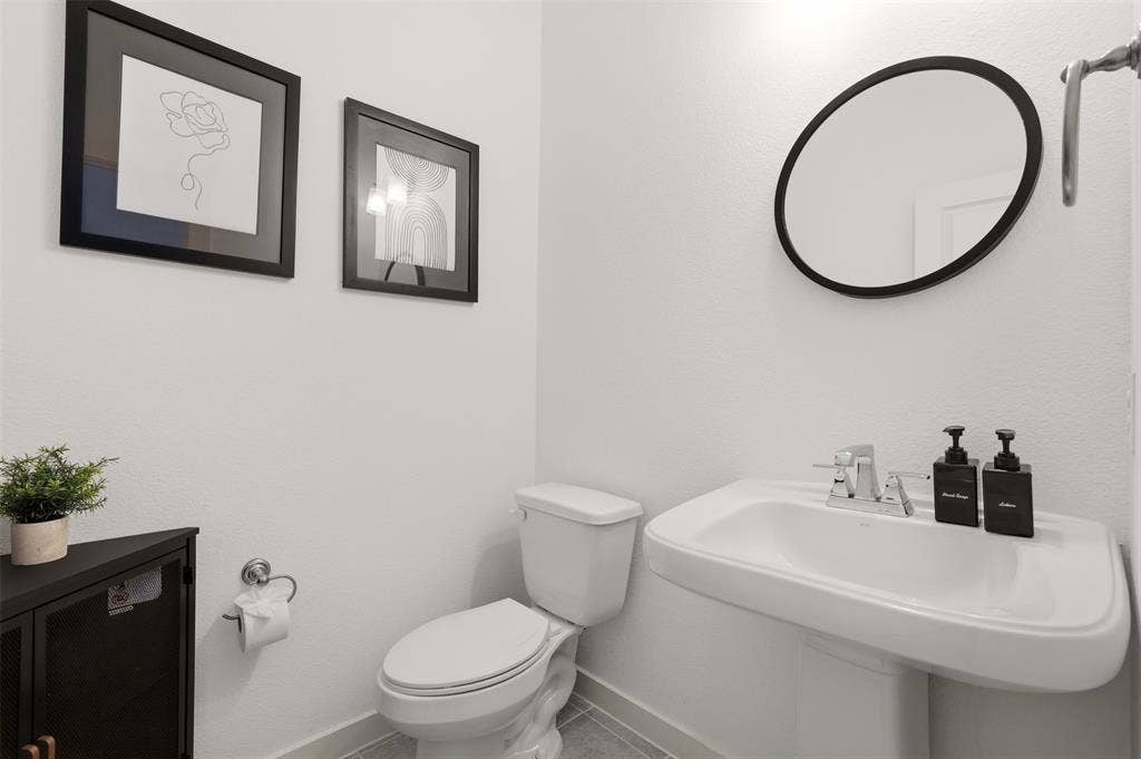 2725 Starburst Drive, Little Elm, TX 75068 Half Bath Down