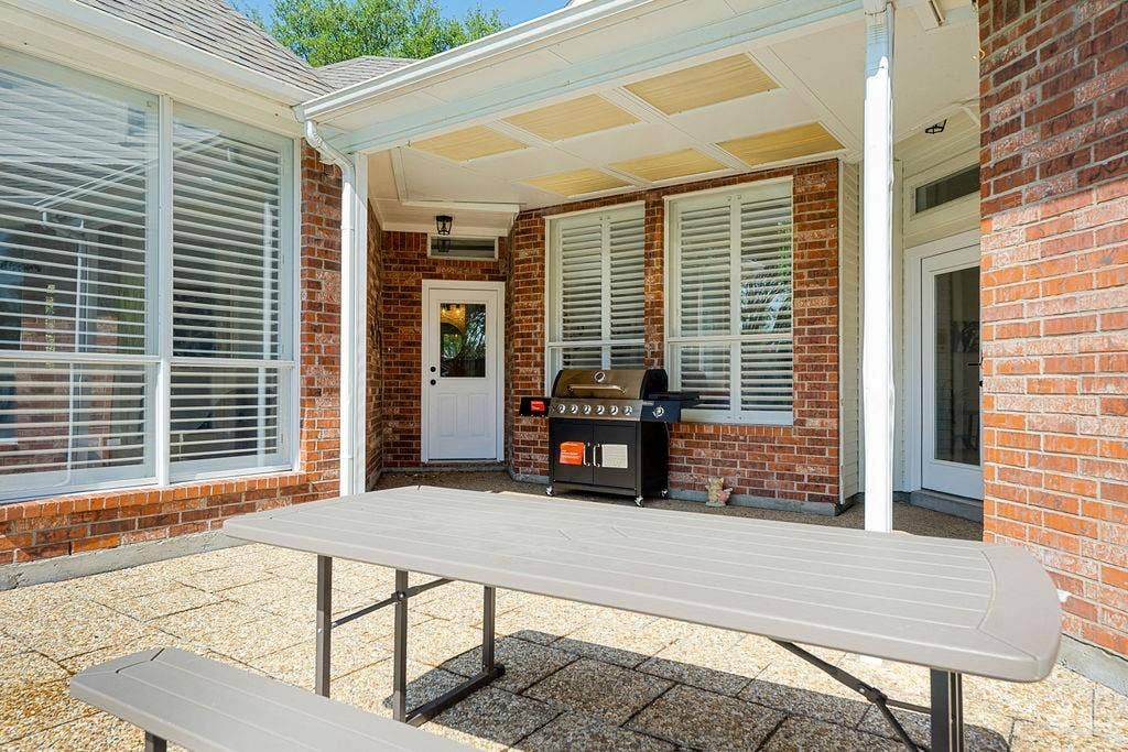 2007 Hill Haven Circle, Richardson, TX 75081 Covered patio featuring a coffered ceiling