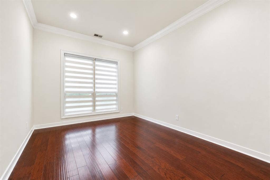 4612 Saxon Drive, Plano, TX 75093 Hardwood flooring, crown molding, recessed lighting, white trim, and a window with blinds