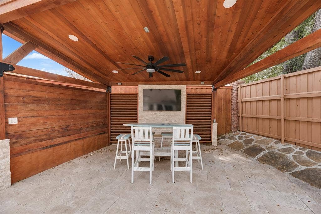 4612 Saxon Drive, Plano, TX 75093 Covered patio featuring a wood-paneled ceiling, recessed lighting, and a ceiling fan
