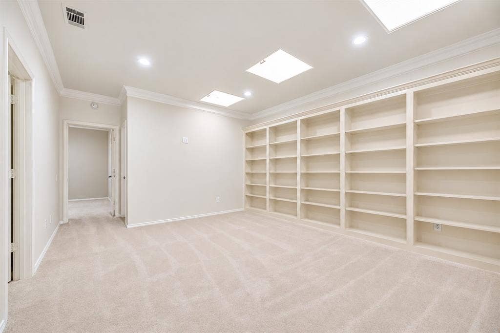 4612 Saxon Drive, Plano, TX 75093 Built-in shelving, recessed lighting, crown molding, and carpet flooring