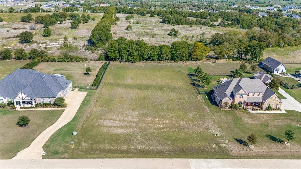C-14 Waterstone Estates, McKinney, TX 75071 Expansive level lot with mature perimeter trees and partially fenced boundaries