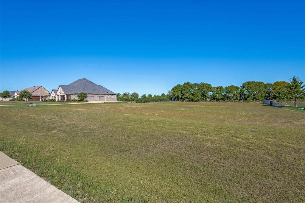 C-14 Waterstone Estates, McKinney, TX 75071 Expansive undeveloped lot featuring a grass ground cover