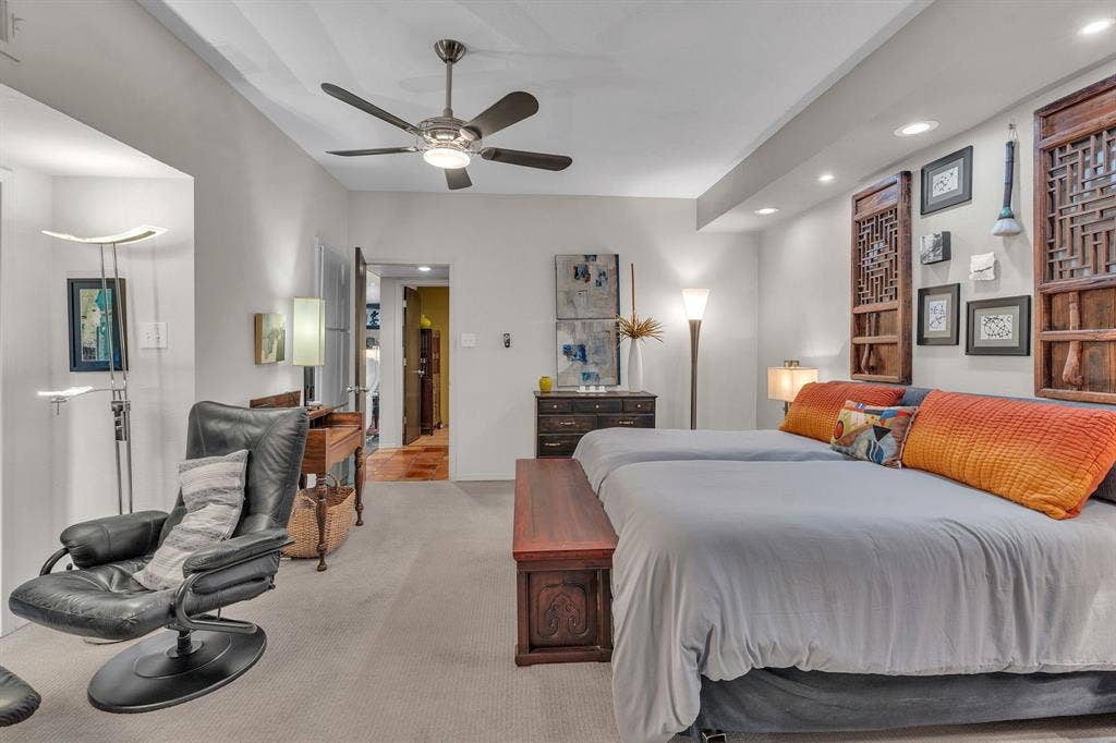 Primary bedroom with recessed lighting