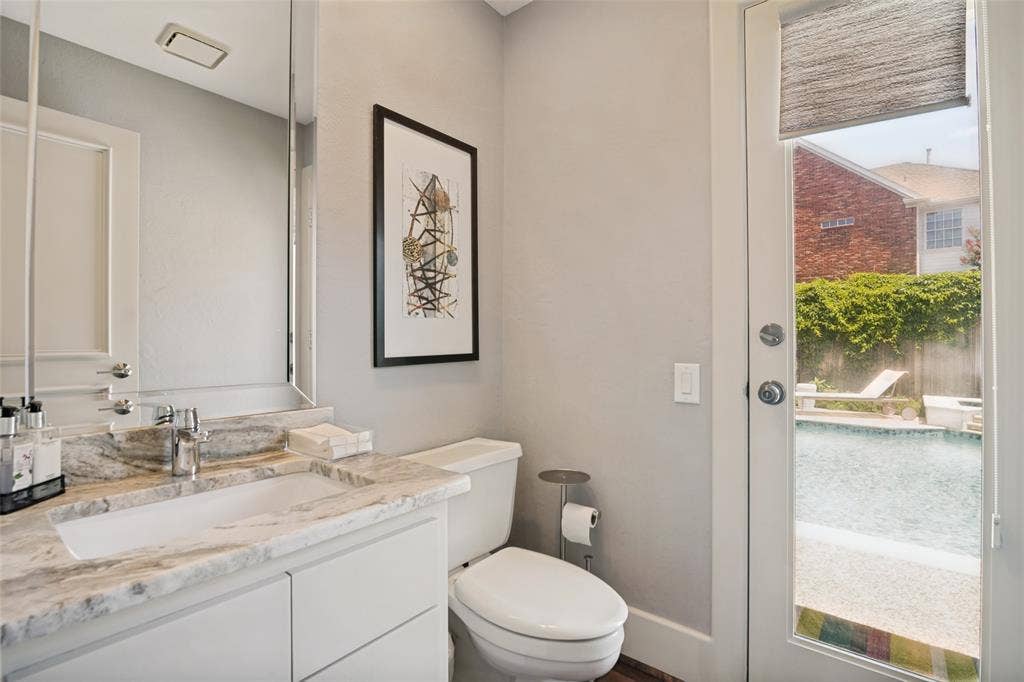 5904 Kensington Drive, Plano, TX 75093 Pool bath! This half bath is located just off the family room...convenient for guests and swimmers!