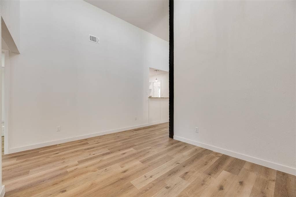 1903 Clemson Drive, Richardson, TX 75081 Vaulted ceiling with wood-finish flooring