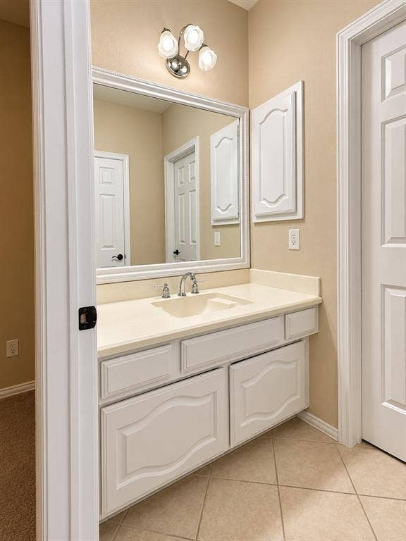 4505 Southgate Drive, Plano, TX 75024 Vanity with an integrated sink, polished chrome faucet, and ample storage