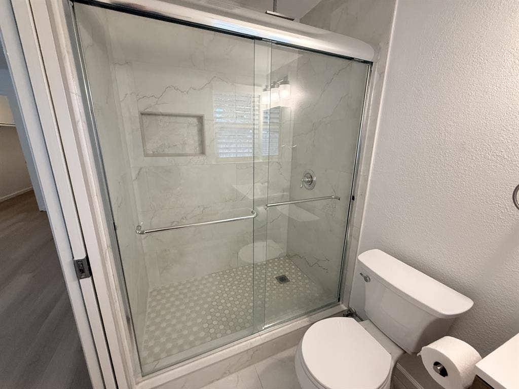 2704 Springlake Court, Irving, TX 75060 Updated master bath. Take a look at that shower!