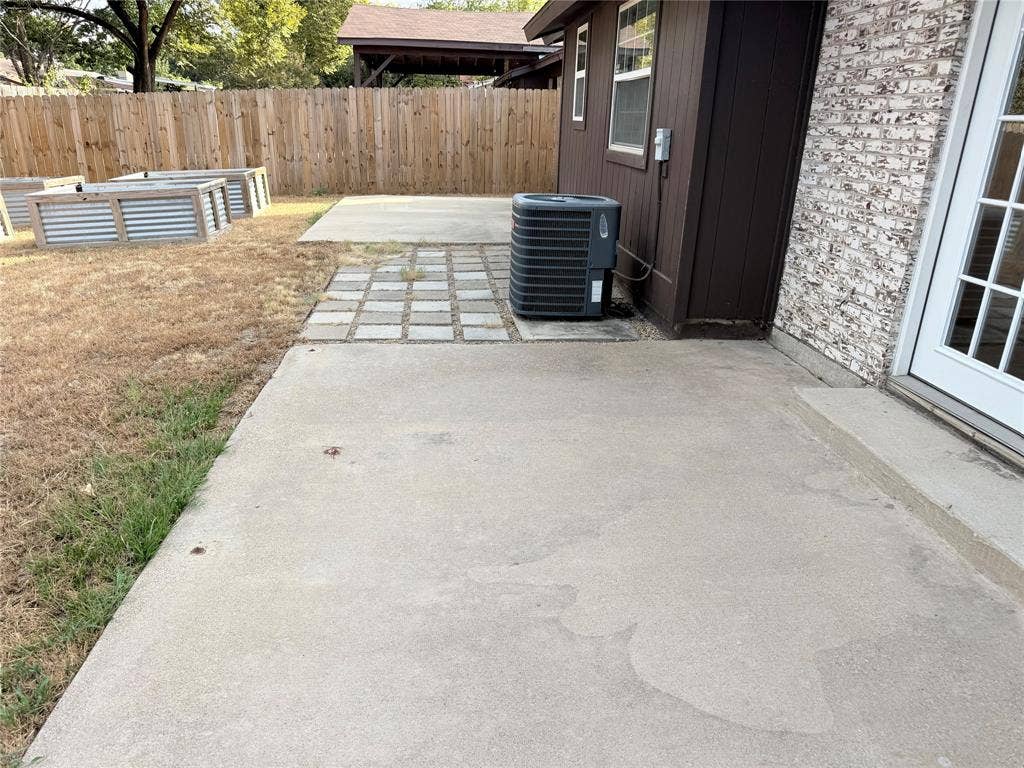 2704 Springlake Court, Irving, TX 75060 Two patios, plus it's ready for you to grow your own veggies.
