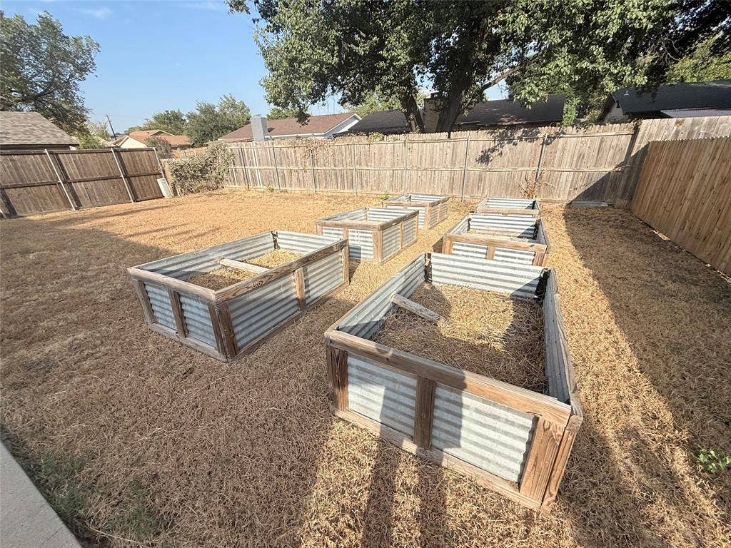 2704 Springlake Court, Irving, TX 75060 Raised beds for you to grow the flowers or vegetables of your choice.