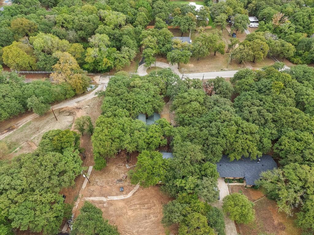 6472 Mark Drive, Burleson, TX 76028 Extensive tree canopy creating a secluded setting