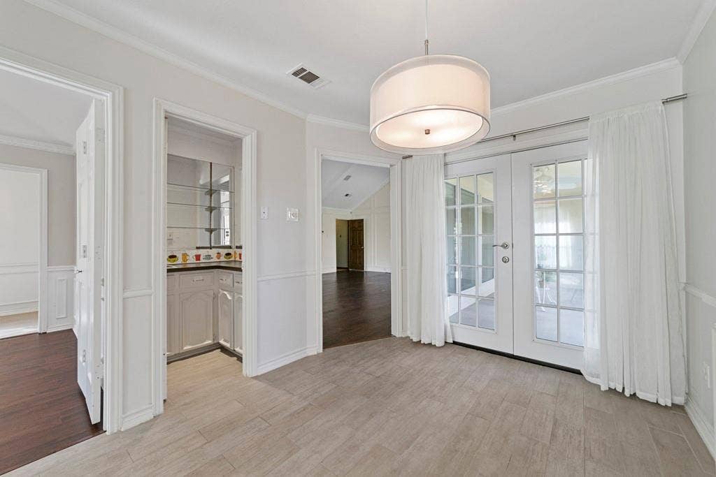 16353 Lauder Lane, Dallas, TX 75248 Tiled flooring with a drum pendant light
