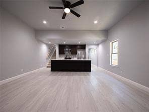 Open concept living room and kitchen.