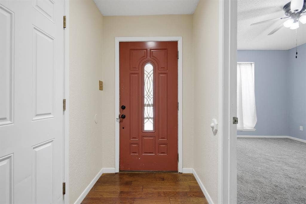 Wood-finish flooring in entry foyer