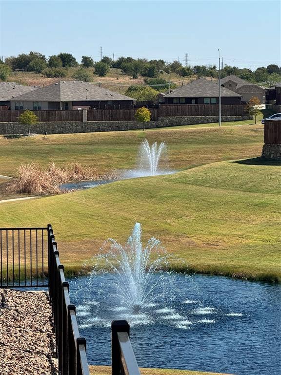 Water view with nearby suburban area