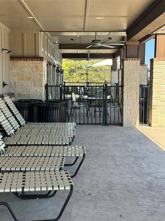 View of patio / terrace with ceiling fan and outdoor dining space