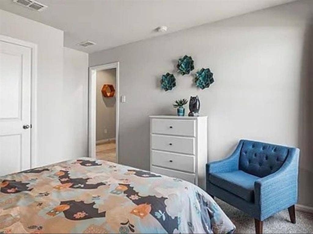 Bedroom featuring carpet flooring