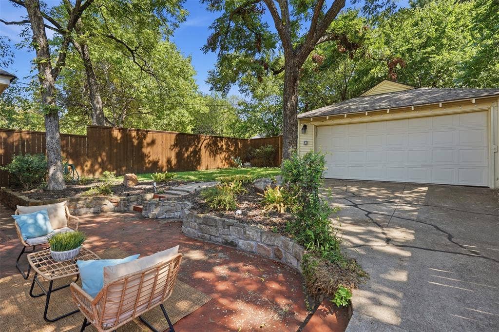 Landscaped backyard and 2-car garage.  Electric gate for gated parking.