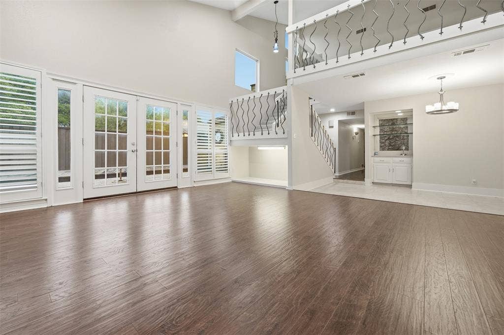 High ceilings and wood-finish flooring