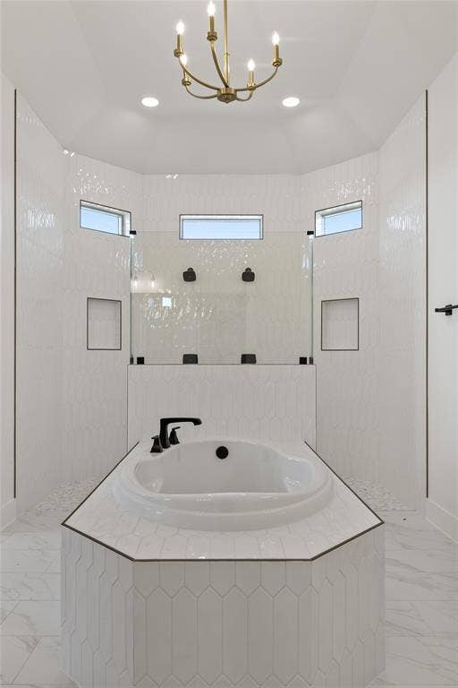 Built-in soaking tub with matte black fixtures