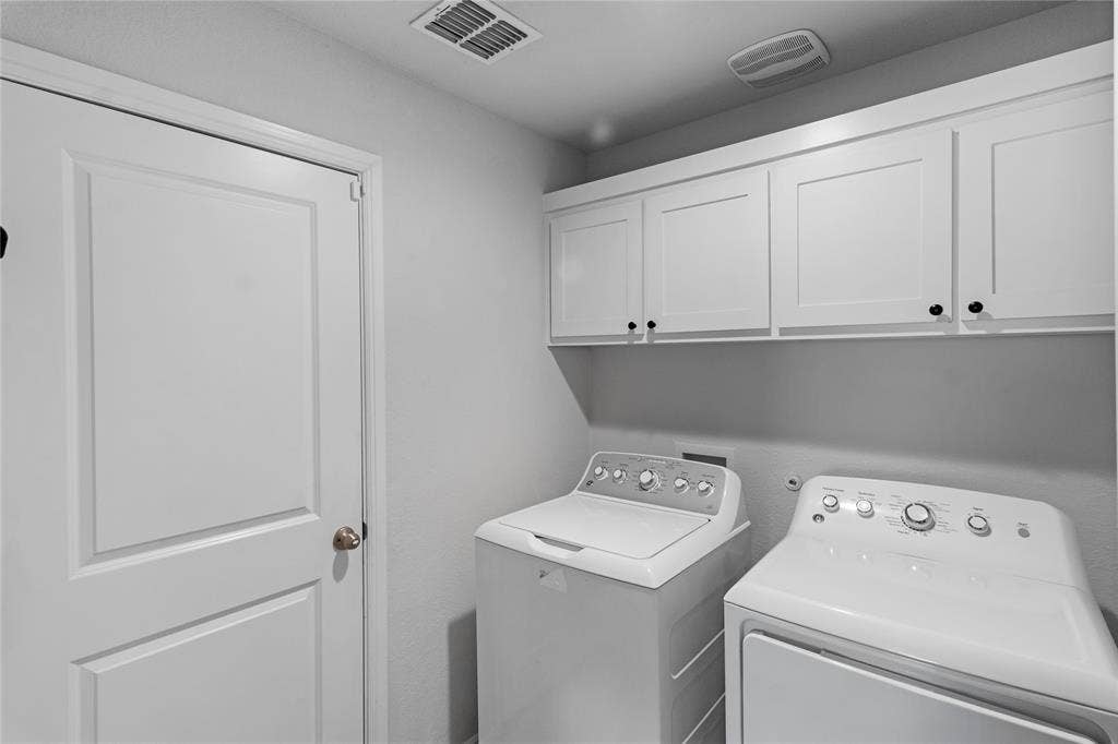 Laundry Room off Family Room, Hallway, Garage Door
