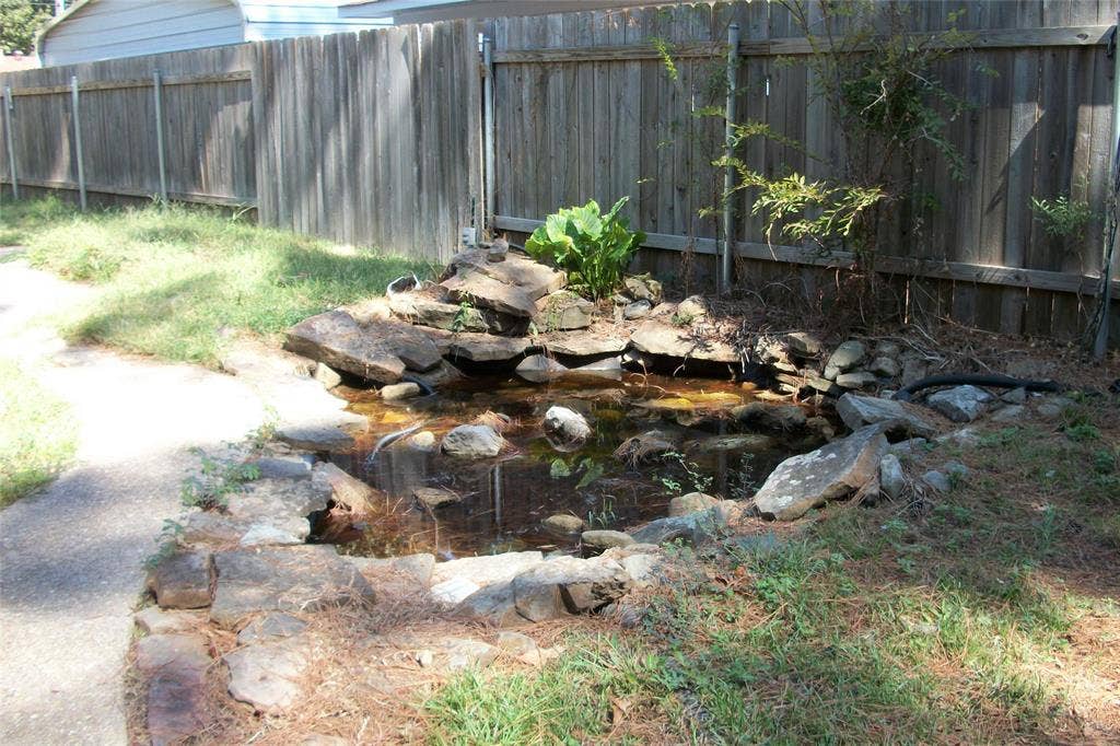 628 Albemarle Drive, Shreveport, LA 71106 rock lined ornamental pond