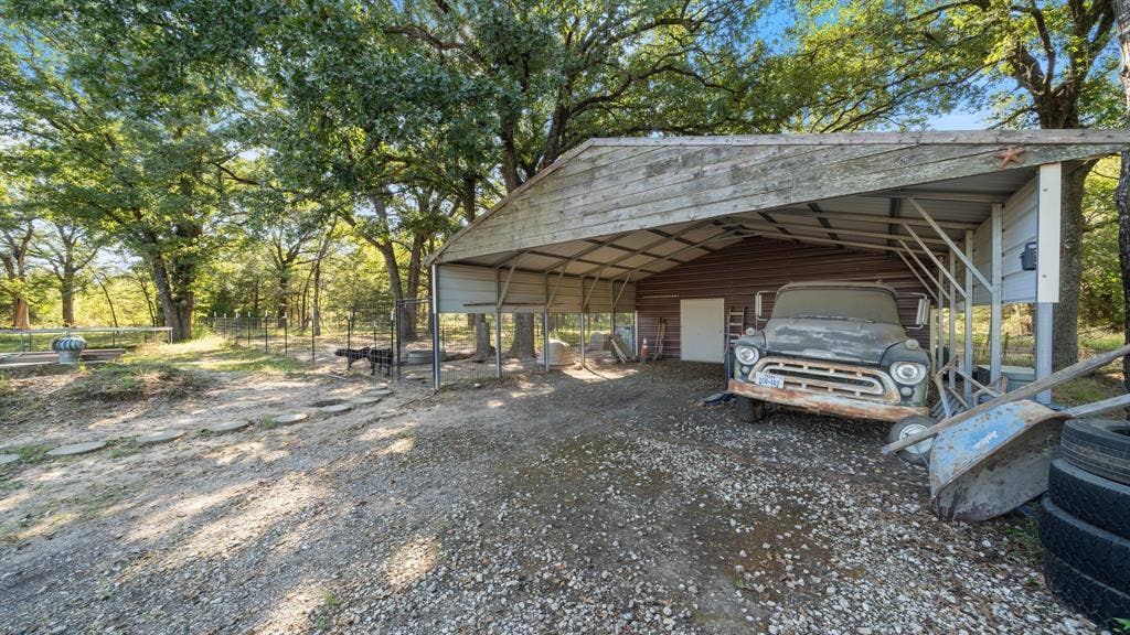 Carport in front of the shop