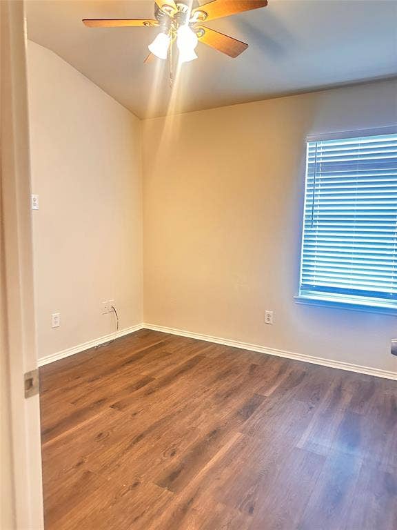 12262 PEAK Circle, Frisco, TX 75035 Spare room featuring dark wood finished floors and ceiling fan