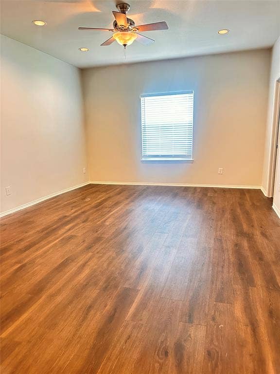 12262 PEAK Circle, Frisco, TX 75035 Empty room featuring recessed lighting, dark wood finished floors, and ceiling fan